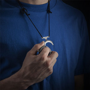 Vicious Circle: Disc Pendant with Knife